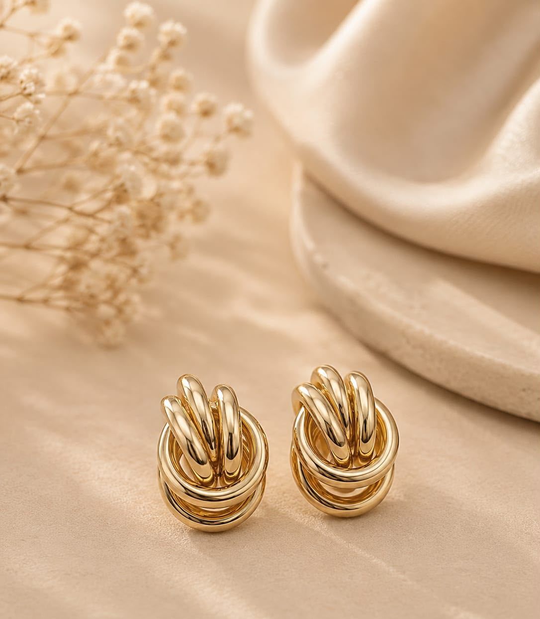 Brinco Nó Volumoso — nó liso banhado a ouro 18K