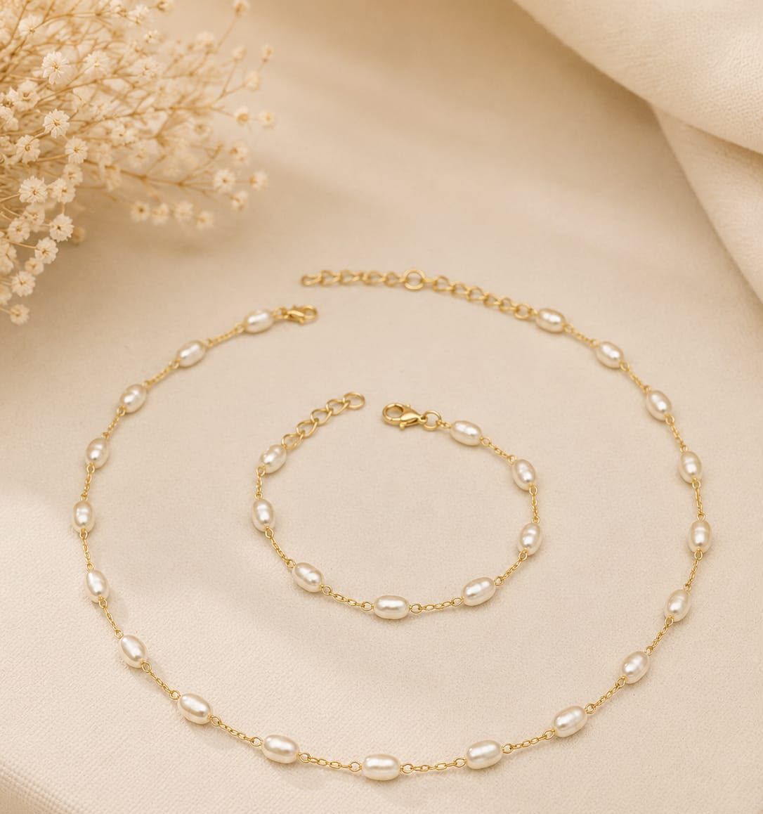 Conjunto Estação — colar e pulseira de pérolas banhado a ouro 18K